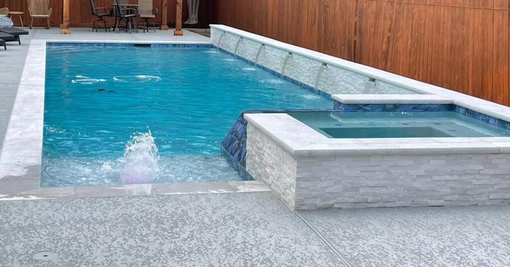 pool and spa with bubbler in shallow end concept Custom Inground Pools In Houston